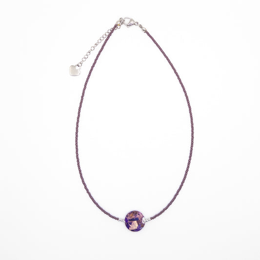 Necklace with a Purple Pendant