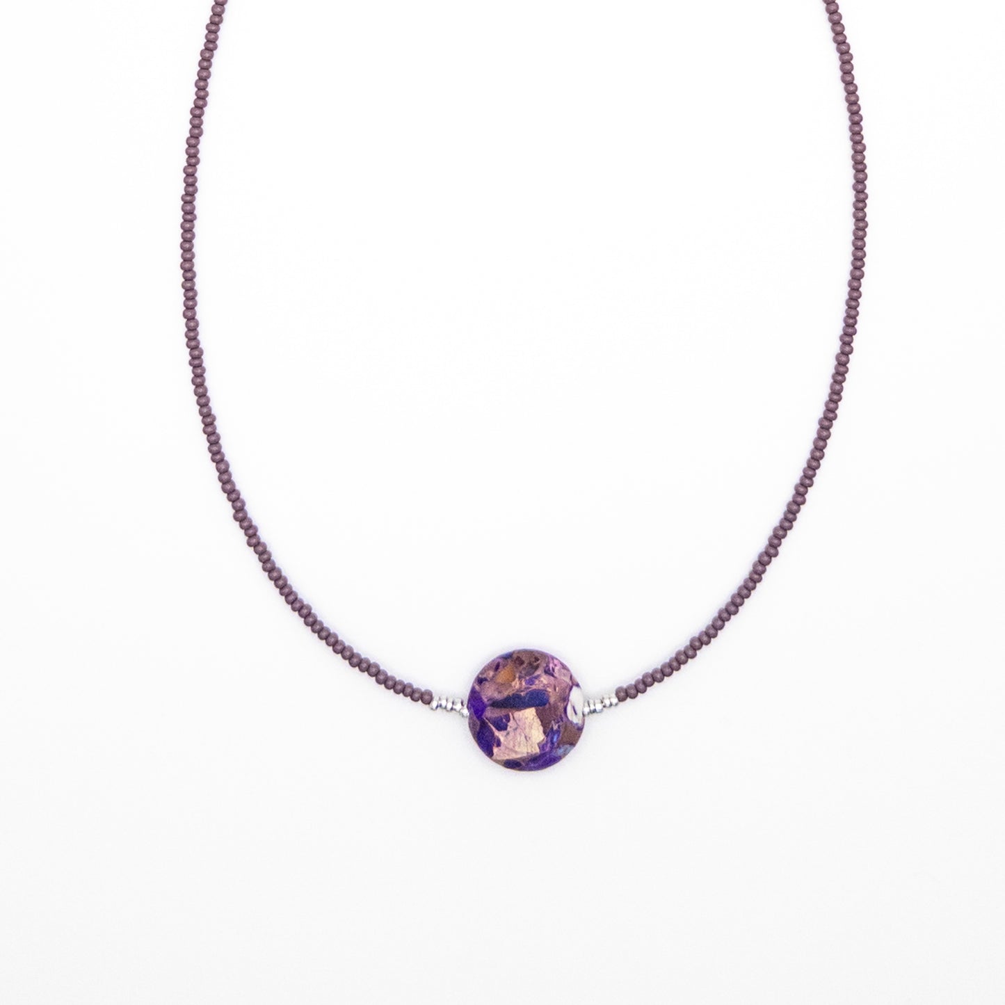 Necklace with a Purple Pendant