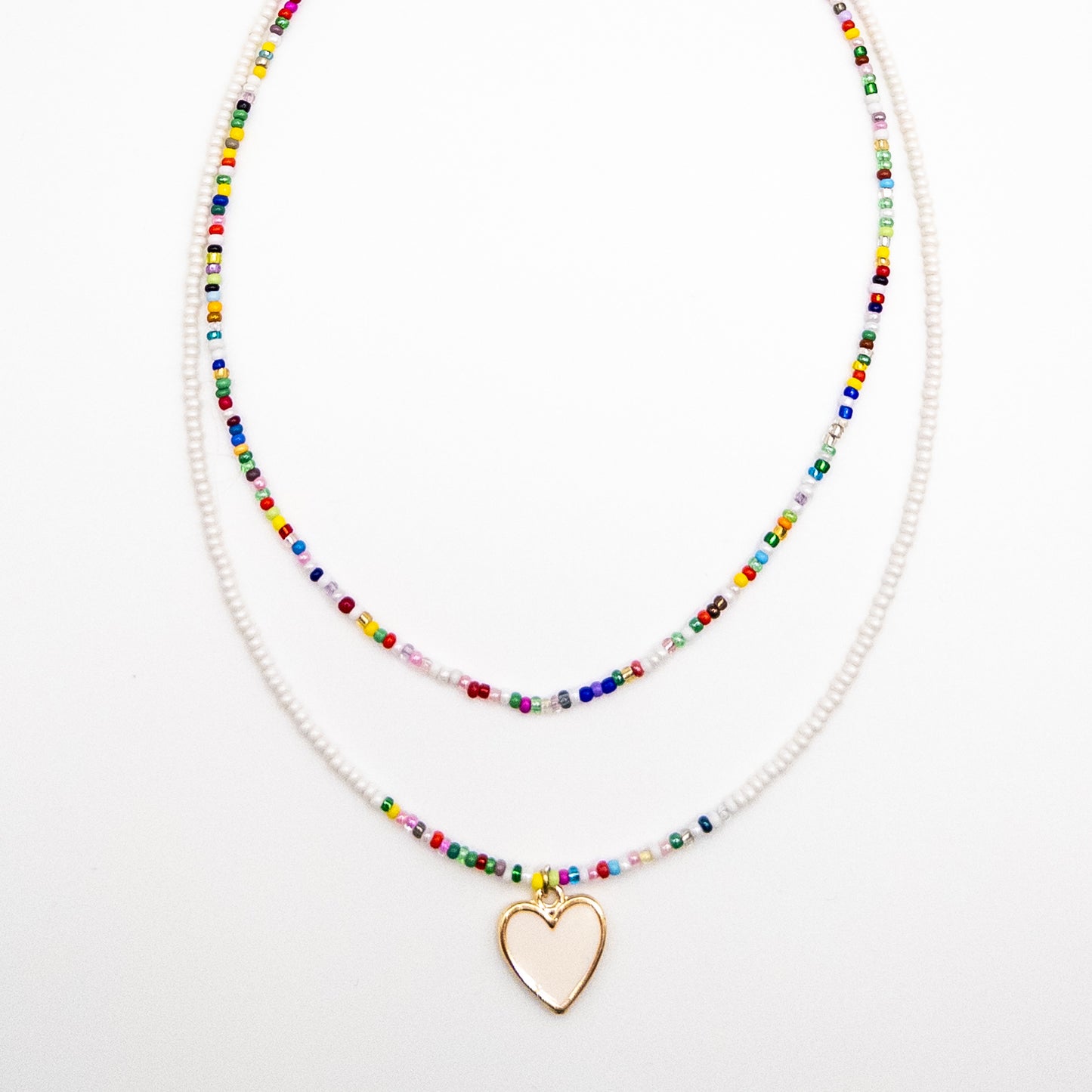 Two Layer Necklace with a White Heart Pendant